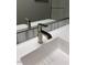 Modern bathroom sink features stainless steel faucet and stylish backsplash at 2887 W Chevelon Dr, Queen Creek, AZ 85144