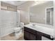 Bathroom features a vanity with dark cabinets, toilet, and a shower/tub combination at 2929 E Binner Dr, Chandler, AZ 85225
