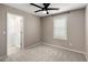 Cozy bedroom boasts natural light from window with sleek ceiling fan at 2929 E Binner Dr, Chandler, AZ 85225