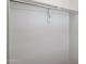 An empty closet, featuring a rod for hanging clothes, offers lots of potential storage space at 2929 E Binner Dr, Chandler, AZ 85225