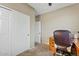 Comfortable bedroom featuring neutral walls and carpet, closet and attached bathroom at 2994 E Sports Ct, Gilbert, AZ 85298