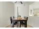 Cozy dining room with modern table, chairs, and wall décor at 2994 E Sports Ct, Gilbert, AZ 85298