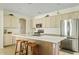 Bright kitchen featuring stainless steel appliances, white countertops, and a large center island at 2994 E Sports Ct, Gilbert, AZ 85298