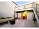 Stylish backyard featuring a fire pit, seating, and an upper balcony, perfect for outdoor living at 3041 S Country Club Way, Tempe, AZ 85282