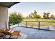 Relaxing balcony with outdoor seating overlooking a green space, perfect for enjoying the outdoors at 3041 S Country Club Way, Tempe, AZ 85282