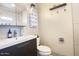 Sleek bathroom with a modern vanity, white towels, and stylish fixtures at 3041 S Country Club Way, Tempe, AZ 85282