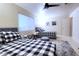 Well-lit bedroom with twin beds and a large window that provides natural light at 3041 S Country Club Way, Tempe, AZ 85282