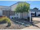 Charming front yard featuring desert landscaping with decorative rock and concrete paver walkway at 3041 S Country Club Way, Tempe, AZ 85282