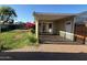 A backyard with a patio, a green lawn and flowers at 332 N 25Th St, Mesa, AZ 85213