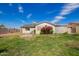 Backyard view with a well maintained lawn and flower bushes at 332 N 25Th St, Mesa, AZ 85213