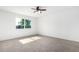 Bright bedroom with a ceiling fan, carpet, and a window at 332 N 25Th St, Mesa, AZ 85213