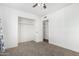 Bedroom with a ceiling fan, carpeted floor, and a closet at 332 N 25Th St, Mesa, AZ 85213