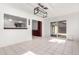 Open dining area with a view of the kitchen and sliding glass doors to the backyard at 332 N 25Th St, Mesa, AZ 85213