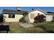 Exterior view of the back of the house surrounded by shrubbery at 332 N 25Th St, Mesa, AZ 85213