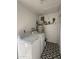 Convenient laundry room featuring tile flooring and washer and dryer hookups at 332 N 25Th St, Mesa, AZ 85213