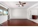 Bright and airy living room featuring hardwood floors and a ceiling fan at 332 N 25Th St, Mesa, AZ 85213