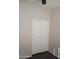 A shot of the bedroom closet featuring sliding doors and a ceiling fan at 37180 W Mondragone Ln, Maricopa, AZ 85138