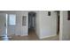 Entry hallway featuring neutral walls, arched doorways and tile flooring at 37180 W Mondragone Ln, Maricopa, AZ 85138