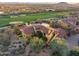 Beautiful aerial view showcasing lush golf course and the privacy of the home's setting amidst desert landscaping at 42171 N Saguaro Forest Dr, Scottsdale, AZ 85262