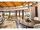 Bright dining room featuring french doors to backyard and stylish lighting fixture at 42171 N Saguaro Forest Dr, Scottsdale, AZ 85262