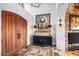 Grand foyer featuring a high ceiling, elegant decor, and a striking stone accent wall at 42171 N Saguaro Forest Dr, Scottsdale, AZ 85262