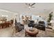 Open-concept living room showcasing tile floors, comfortable seating, and kitchen view at 4320 E Ficus Way, Gilbert, AZ 85298