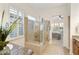 Elegant main bathroom featuring glass shower, granite countertops and plantation shutters at 4320 E Ficus Way, Gilbert, AZ 85298