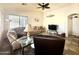 Inviting living room with tile flooring, neutral walls, and a welcoming seating arrangement at 4643 E Cherry Hills Dr, Chandler, AZ 85249