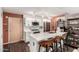 Well-lit kitchen with white cabinets, a kitchen island, and stainless steel appliances at 4808 N 24Th St # 1427, Phoenix, AZ 85016