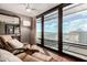 Relaxing living room with seating near large windows showcasing city views at 4808 N 24Th St # 1427, Phoenix, AZ 85016