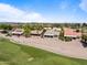 An aerial shot showcasing golf course living and community amenities at 511 W Cherrywood Dr, Sun Lakes, AZ 85248