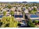 Beautiful aerial view of a home with solar panels in a well-maintained suburban neighborhood at 5291 W Angela Dr, Glendale, AZ 85308