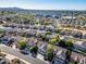 Aerial view of a community with well-maintained streets and desert landscaping at 5291 W Angela Dr, Glendale, AZ 85308