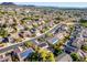 Aerial view of a charming community and its lovely desert landscaping at 5291 W Angela Dr, Glendale, AZ 85308