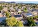 Desirable community with an aerial view of a home featuring solar panels and landscaped backyard at 5291 W Angela Dr, Glendale, AZ 85308