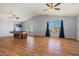 Large game room with a pool table and multiple ceiling fans at 5291 W Angela Dr, Glendale, AZ 85308