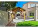 Outdoor kitchen featuring a built-in grill and bar area at 5291 W Angela Dr, Glendale, AZ 85308