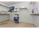 Well-organized walk-in closet featuring built-in shelving and ample storage space for linens and personal items at 5291 W Angela Dr, Glendale, AZ 85308