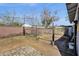 Spacious backyard featuring a fenced in enclosure and rock pavers at 5517 N 61St Ln, Glendale, AZ 85301