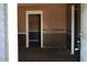 View of a carpeted living room, showcasing spacious layout at 6319 E Albany St, Mesa, AZ 85205