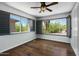 Bedroom with hardwood floors, base trim and views to the outside at 7650 E Williams Dr # 1038, Scottsdale, AZ 85255