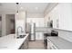 Close-up of kitchen featuring stainless steel appliances and stone countertops at 7741 E Journey Ln, Scottsdale, AZ 85255