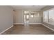 Open living room with hardwood flooring and bright natural lighting at 7741 E Journey Ln, Scottsdale, AZ 85255