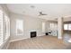 Living room featuring a fireplace and bright natural light at 7741 E Journey Ln, Scottsdale, AZ 85255