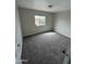 Cozy bedroom features neutral walls, new carpet and natural light at 8427 W Glendale Ave # 31, Glendale, AZ 85305