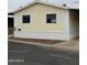 Charming home with light yellow siding and white trim at 8427 W Glendale Ave # 31, Glendale, AZ 85305