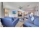 Open-concept living room with bright natural light and tile flooring at 8490 S 165Th Dr, Goodyear, AZ 85338