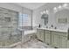 This bathroom features a walk-in shower, bath tub, and double sinks at 877 E La Costa Pl, Chandler, AZ 85249