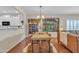 Inviting dining room adjacent to living space, showcasing stylish decor at 877 E La Costa Pl, Chandler, AZ 85249