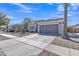 Charming single-story home featuring desert landscaping and a spacious two-car garage at 877 E La Costa Pl, Chandler, AZ 85249